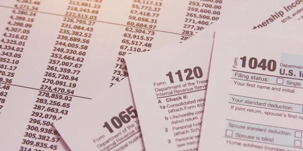Individual and business tax preparation — tax forms 1040, 1120, 1065